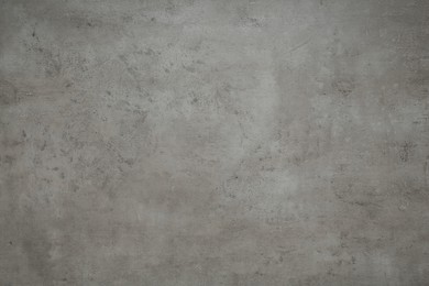 Light grey stone surface as background, top view