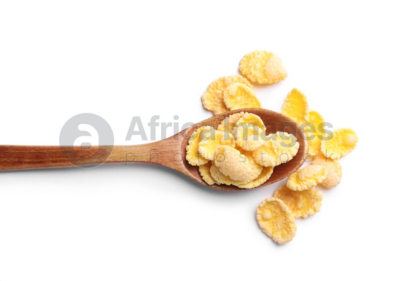 Photo of Wooden spoon of tasty crispy corn flakes on white background, top view