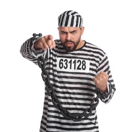 Angry prisoner in special uniform with chained hands on white background
