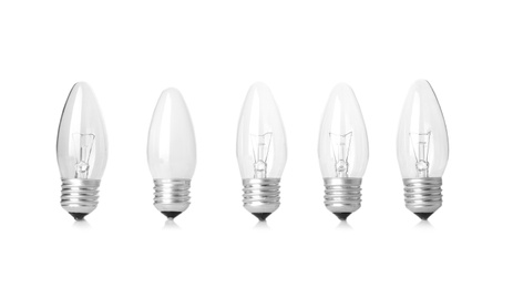 Frosted and transparent lamp bulbs on white background