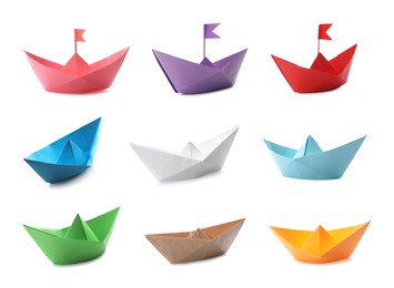 Set with multicolor paper boats on white background 