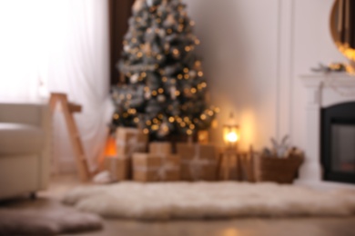 Blurred view of beautiful room interior with Christmas tree