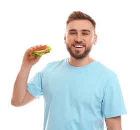 Photo of Young man with tasty sandwich on white background