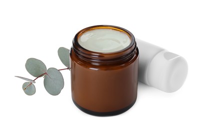 Different hand care cosmetic products and eucalyptus on white background
