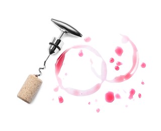 Photo of Wine stains, corkscrew and stopper on white background, top view