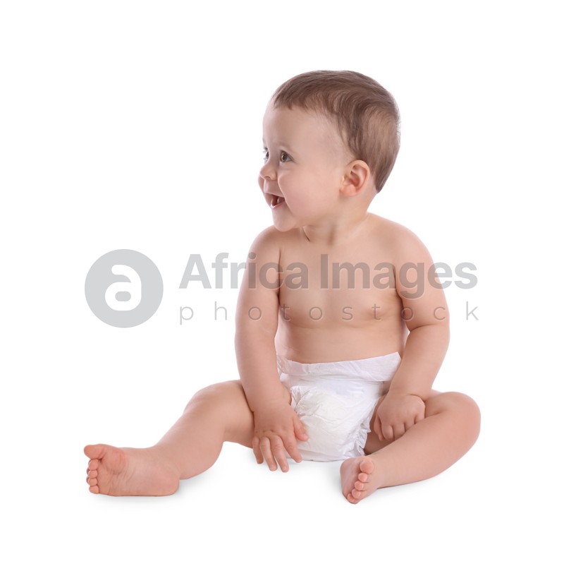 Cute baby in dry soft diaper sitting isolated on white
