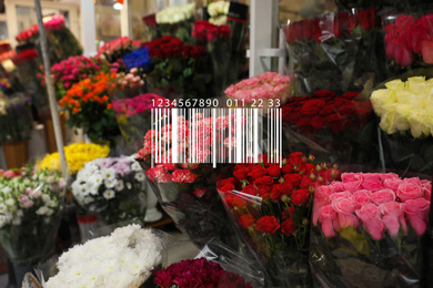Barcode and beautiful fresh flowers at wholesale market