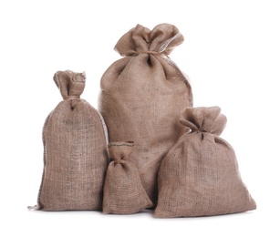 Burlap bags on white background. Organic material
