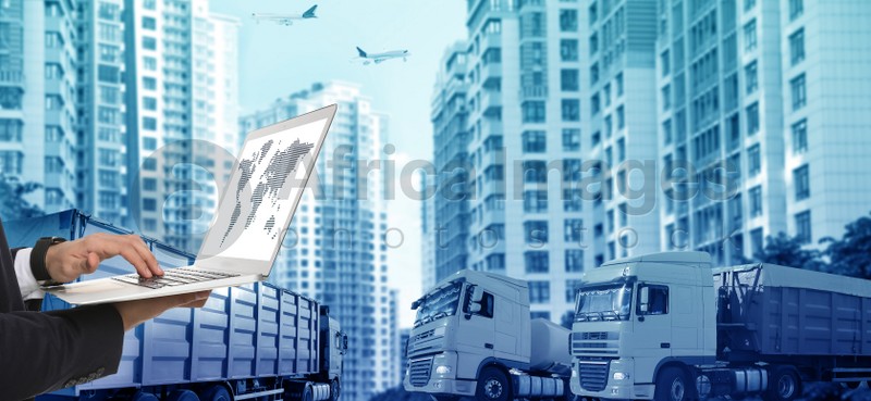 Logistics concept, banner design. Businessman with laptop, closeup. Trucks and buildings on background, toned in blue