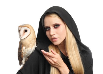 Witch in black mantle with owl isolated on white. Scary fantasy character
