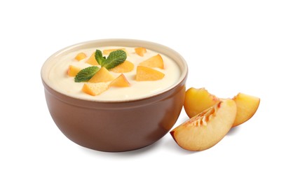 Delicious yogurt with fresh peach and mint on white background