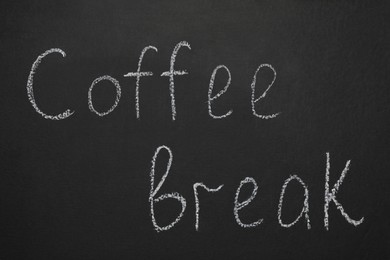 Phrase Coffee Break written with chalk on blackboard
