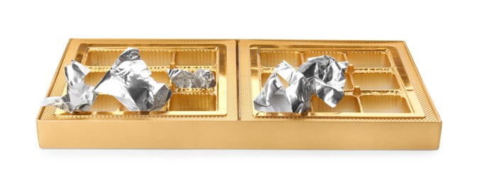 Photo of Empty box of chocolate candies with foil isolated on white