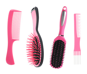 Set with different hair brushes and combs on white background