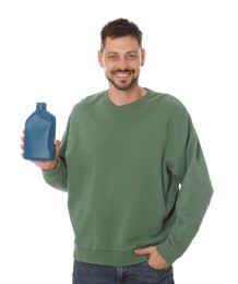 Man holding blue container of motor oil on white background