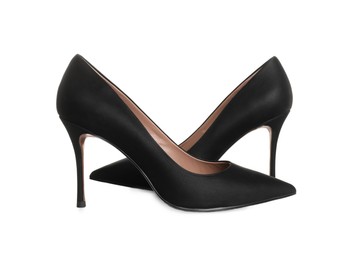 Pair of elegant black high heel shoes on white background