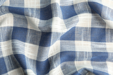 Texture of blue checkered fabric as background, closeup