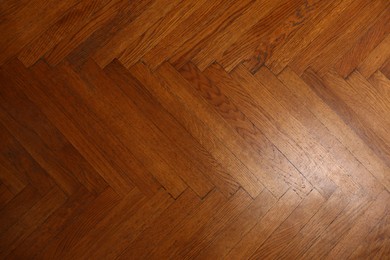 Wooden parquet floor as background, top view