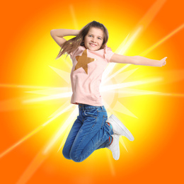 Preteen girl jumping on colorful background. School holidays