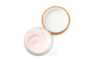 Jar of face cream isolated on white, top view