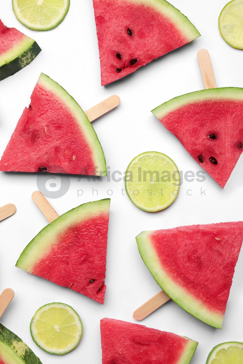 Tasty sliced watermelon and lime on white background, top view