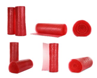 Set with red bubble wrap rolls on white background