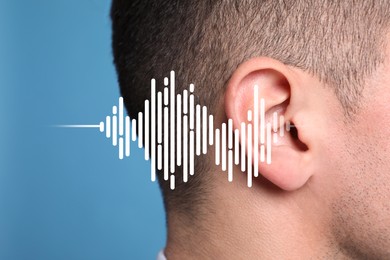 Hearing loss concept. Man and sound waves illustration on light blue background, closeup