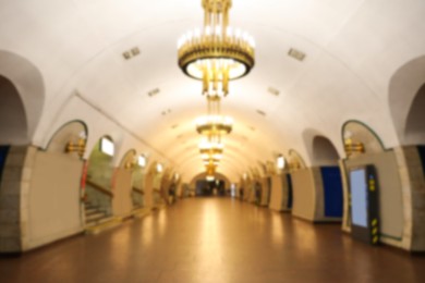 Photo of Blurred view of main subway station vestibule. Public transport