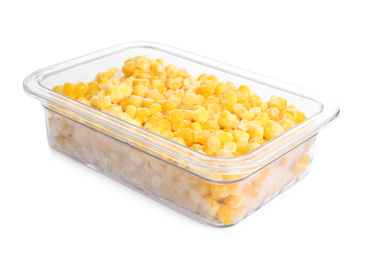 Frozen corn in plastic container isolated on white. Vegetable preservation