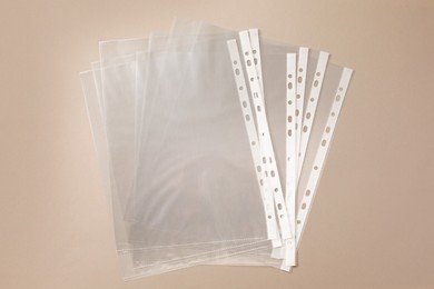 Photo of Punched pockets on light grey background, flat lay