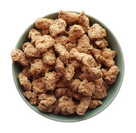 Dehydrated soy meat chunks in bowl on white background, top view