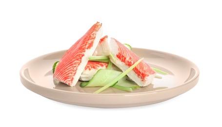 Plate with fresh crab sticks and cucumber isolated on white