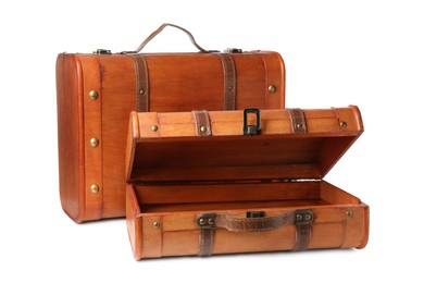 Beautiful brown vintage suitcases on white background