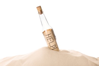 Corked glass bottle with Help note in sand on white background