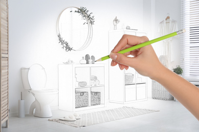 Woman drawing bathroom interior design. Combination of photo and sketch