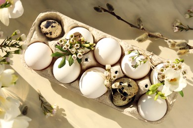 Photo of Festive composition with eggs and floral decor on windowsill indoors, flat lay. Happy Easter