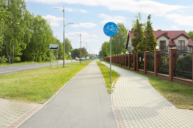 Bicycle and pedestrian lanes outdoors on sunny day