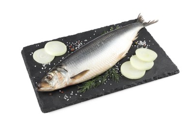 Photo of Slate plate with salted herring, onion, dill and spices isolated on white