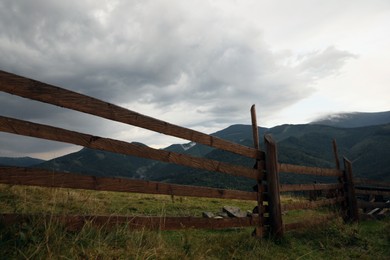 Beautiful view of mountain countryside with wooden fence