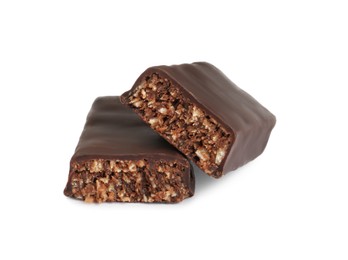 Photo of Halves of tasty chocolate glazed protein bar on white background