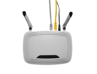 Modern Wi-Fi router on white background, top view