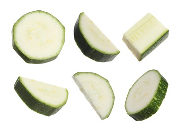 Set with pieces of fresh ripe zucchini on white background