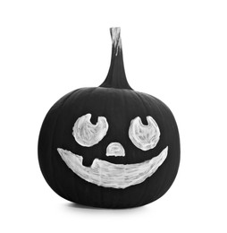 Black pumpkin with drawn scary face isolated on white. Halloween celebration