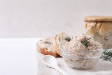 Photo of Delicious lard spread on white table. Space for text