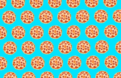 Pepperoni pizza pattern design on light blue background