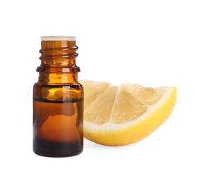 Bottle of citrus essential oil and cut fresh lemon isolated on white