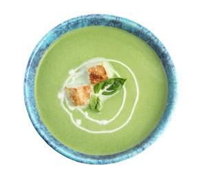 Delicious broccoli cream soup with croutons isolated on white, top view