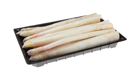 Fresh ripe asparagus in plastic pack isolated on white