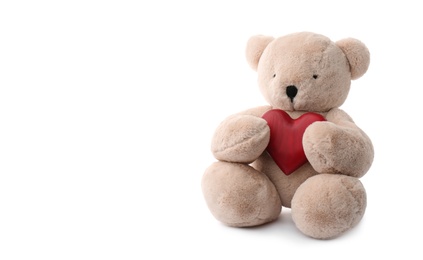 Cute teddy bear with red heart isolated on white. Valentine's day celebration