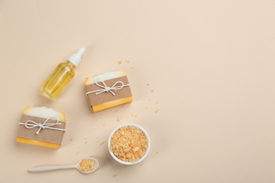 Flat lay composition with natural handmade soap on beige background. Space for text